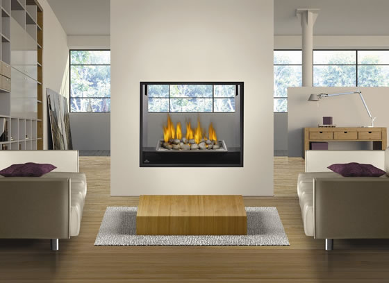 The HD81 See Thru Napoleon Gas Fireplace provides flames for two rooms with its exceptional see-thru design